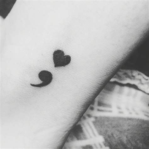 anxiety semicolon tattoo meaning.